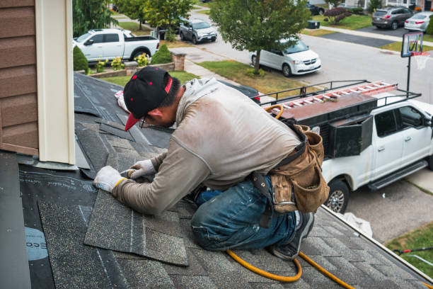 Professional Roofing technician working in Laura, IL